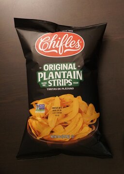 Bradenton, Florida, U.S - March 27, 2026 - Bag of Chifles Original Plantain Strips showing product branding, dietary labels, best-by date, and non-GMO certification