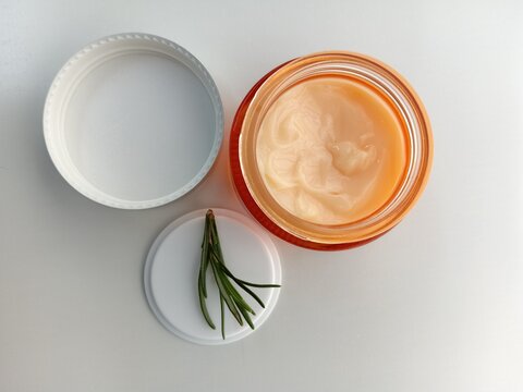 Organic Face Moisturizer with Herbal Extract and White Lid Flat Lay