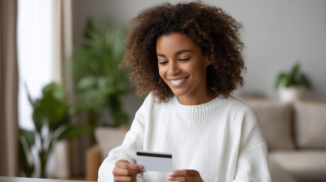Woman consolidating credit card statements into single folder at minimalist desk with scissors cutting up cards and relief visible on face in clean white room, perfect for debt consolidation freedom