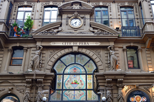 Istanbul, Turkey - December 10, 2023: Cite de Pera famous flower passage Cicek Pasaji in Turkish entrance facade in Istiklal Street in Beyoglu