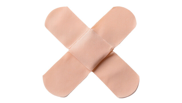 Beige adhesive bandages crossed in X shape for injury, isolated on transparent background