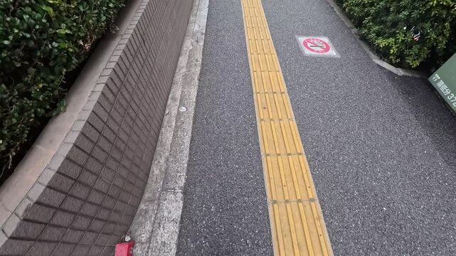 Close view walking on tactile paving blocks for visually impaired