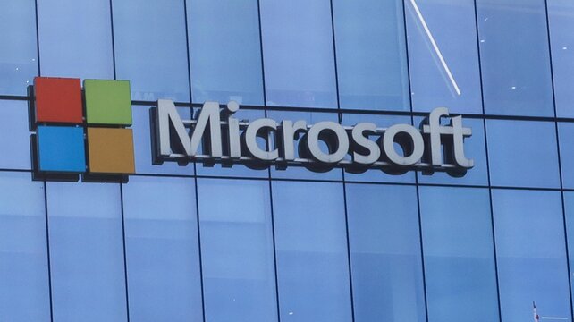 Microsoft Canada Excellence Centre, Vancouver Downtown, British Columbia, Canada- 2 Oct 2025: Microsoft brand name logo on the glass facade of the building