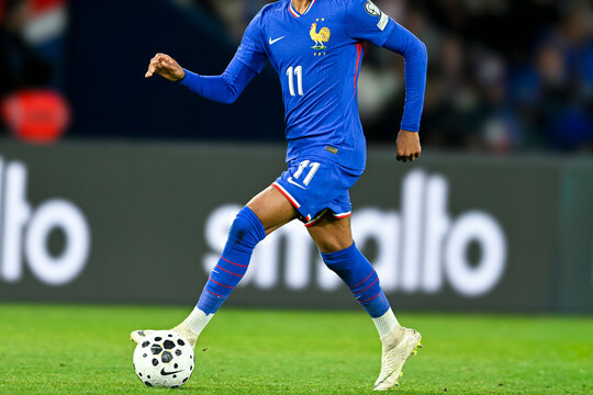 Illustration with the blue jersey of a unrecognizable French football player wearing the rooster emblem. French football national team in competition.