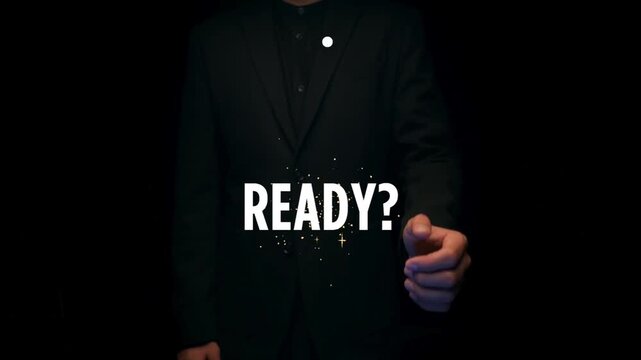 A person skillfully manipulating video content with their hands in a dark room