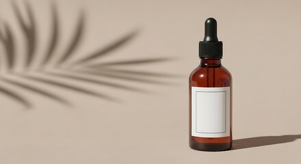 Fototapeta premium Amber glass dropper bottle with white label and palm leaf shadow on beige background amber bottle de