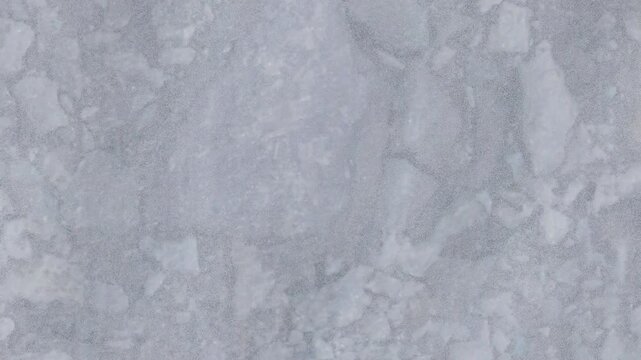 Snow Surface Texture Close Up with Frozen Ice Patterns Background