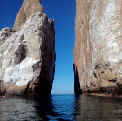 Majestic view of Kicker Rock (Leon Dormido) rock formation in Galapagos Islands, Ecuador. © Maribel