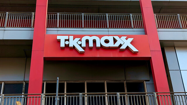 Leicester, England, UK - 21 March 2026: TK Maxx store signage, red retail shop logo, shopping mall exterior, famous fashion brand storefront, department store facade