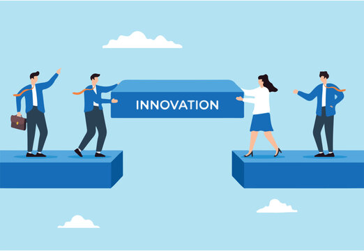 Business team constructing bridge over gap labeled Innovation concept change adapting and collaborative to achieve success