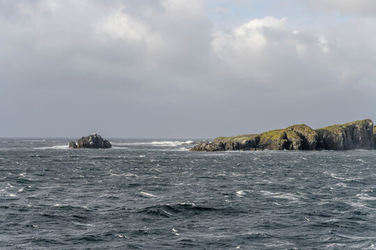 farhest cliffs of Espadon cape at Horn island from north-east, Chile