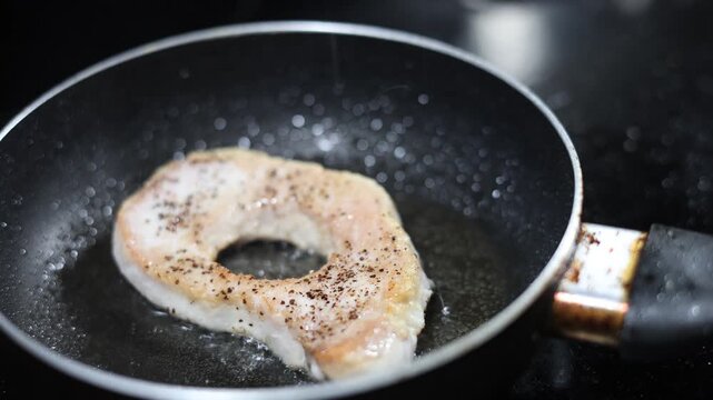 Pork Chop Frying With Hole And Egg Drop