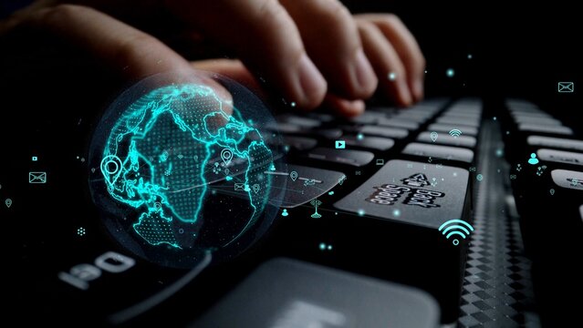 A close-up of hands typing on a keyboard paired with a digital globe, illustrating the interconnectedness of global communication and modern technology in the workplace. Xenic