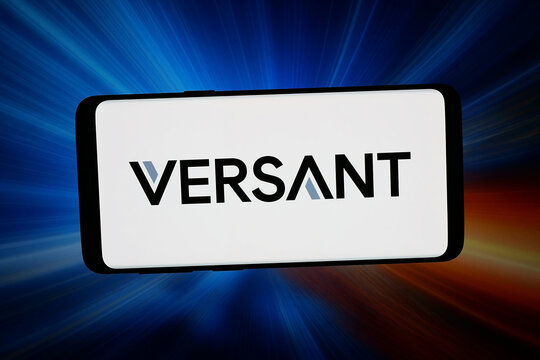 Stuttgart, Germany - 03-19-2026: In this photo illustration, the logo of US company Versant Media Group Inc. is displayed on a smartphone in front of abstract background on computer screen.
