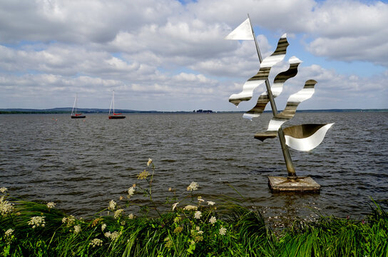 Steinhude, Germany - July 7 2018 Steel sculpture Undines Traum (Dream of Undine) of Hans J&uuml;rgen Zimmermann located at the Lake Steinhude