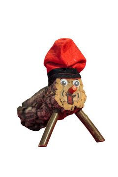 Handcrafted wooden doll made from rustic folk art, Ti&oacute; de Nadal, popularly known as Caga Ti&oacute;, a traditional Christmas character from Catalonia.