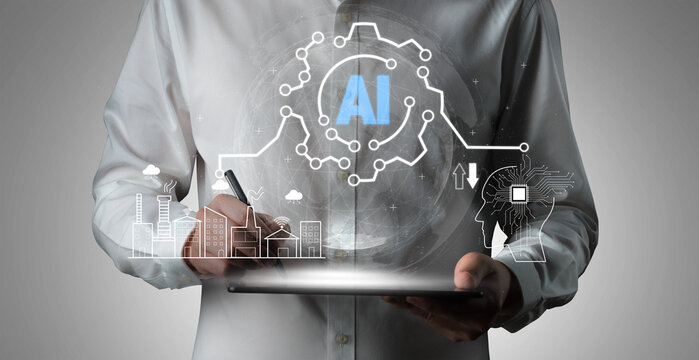 Futuristic Businessman Using Tablet and Stylus to Access Artificial Intelligence Technology and Data Analytics in a Modern Corporate Environment Quark.