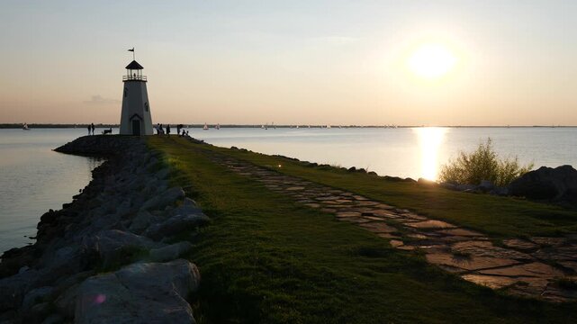 Lighthouse on a lake during sunset, Lake Hefner, Oklahoma City, Oklahoma