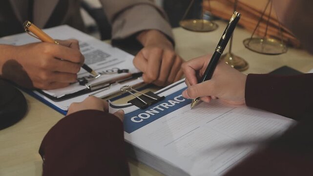 Lawyer explained to the client about the law that must be brought against the court case.