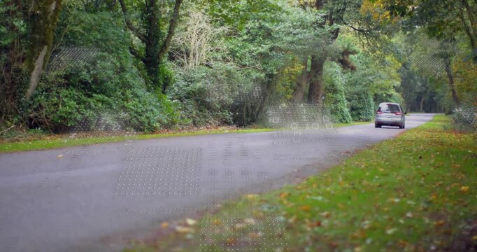 Minivan entering frame on road causing dotted binary overlay showing tech data, shifting, fading