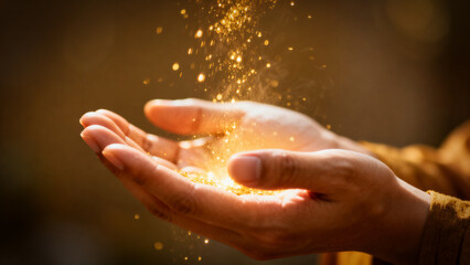 Close-up of golden light and particles rising from hands, ritual blessing