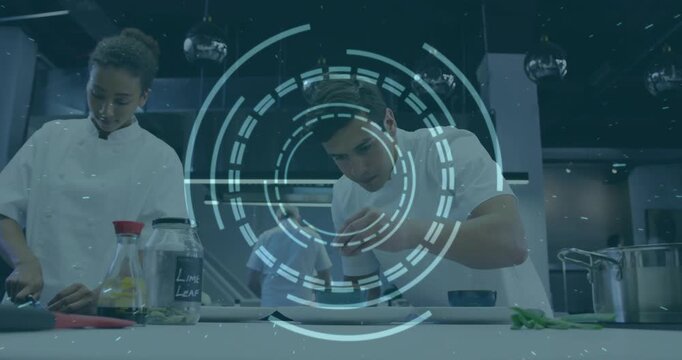 Vertical video: Starting male chef leaning placing garnish at prep counter with HUD preparing plate