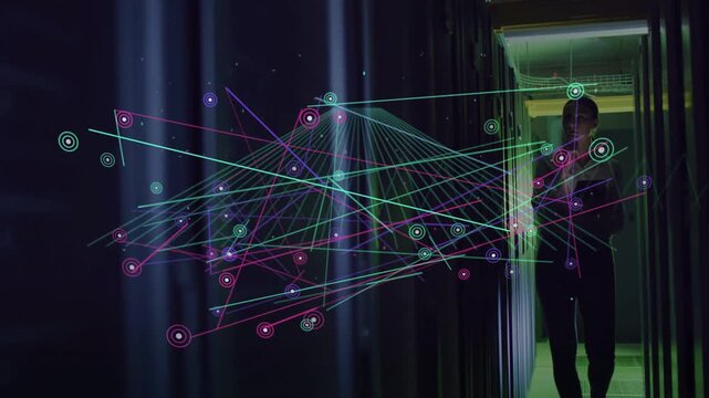 Female tech walking datacenter aisle tapping handheld and directing 3D nodes into pyramid for audit