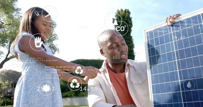 Girl touching shoulder pointing, man kneeling tilting solar panel, AR icons showing CO2 to teach