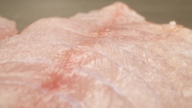 Cooking fish Peruvian ceviche close-up. Fresh cooked ceviche made of raw white fish. Traditional Peruvian cuisine. Cooking seafood dish.