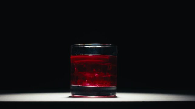 Vermouth Negroni, spanish wine drink, Alcoholic Americano Cocktail bitter, sweet vermouth and soda water, close up of making drink, summer spanish vacations. 