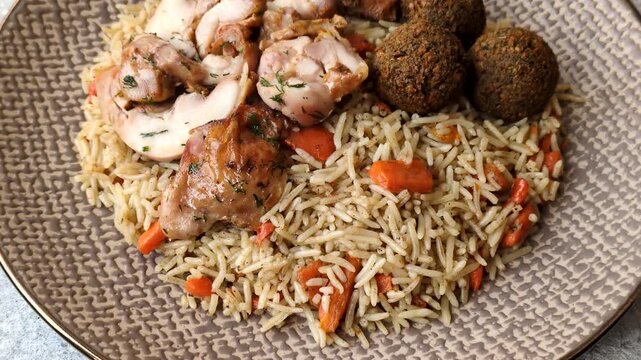 Kabsa or mandi, an Arabic dish with rice and chicken, salt, and spices. Kabsa or mandi as a food background for your design