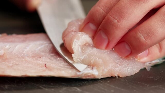 Cooking fish Peruvian ceviche close-up. Fresh cooked ceviche made of raw white fish. Traditional Peruvian cuisine. Cooking seafood dish.