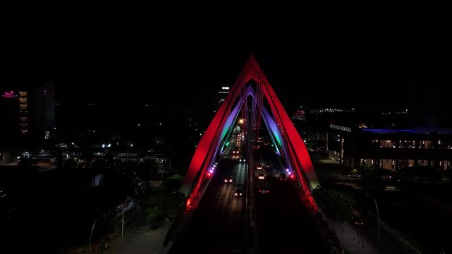 Aerial drone view of Matute Remus bridge with city traffic in Guadalajara, modern urban infrastructure Mexico