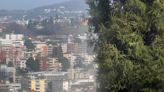 Panoramic view of Lugano city and Lake Lugano from Monte San Salvatore funicular railway, Switzerland, urban and mountain landscape