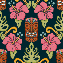 Tropical tiki mask seamless pattern with pink hibiscus flowers and green monstera leaves on dark background for exotic summer beach wallpaper and textile design © Marie