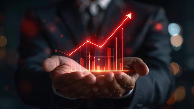 Hand displaying red downward financial chart illustrating economic decline loss risk and negative market trend