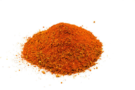 Cajun seasoning spices pile isolated on white background