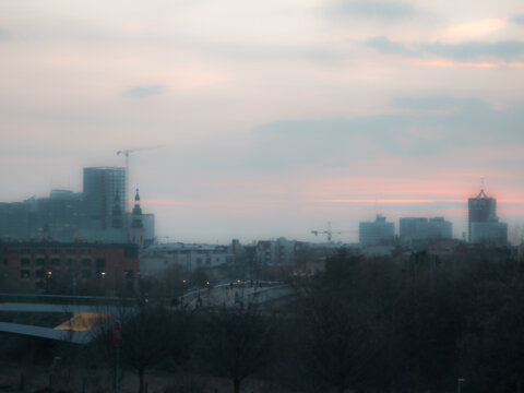 Hazy city skyline at dusk