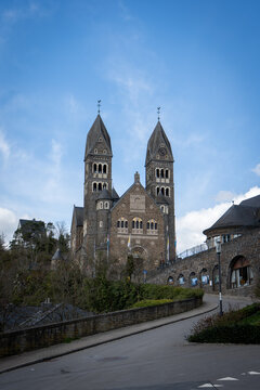Twin towers of Clervaux Parish Church from the road, Luxembourg 2