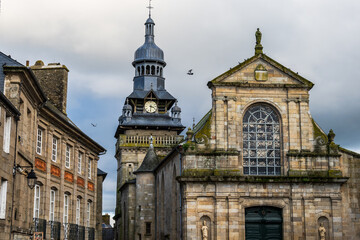 Obraz premium Church and its bell tower in Moncontour in Brittany - France