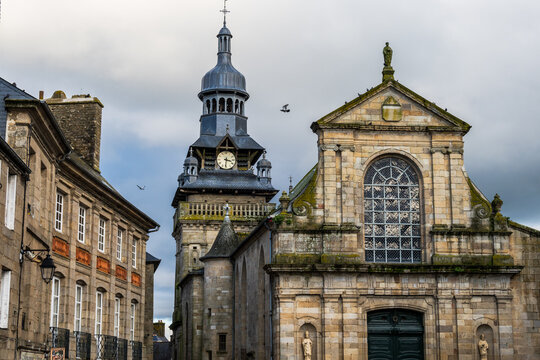 Church and its bell tower in Moncontour in Brittany - France