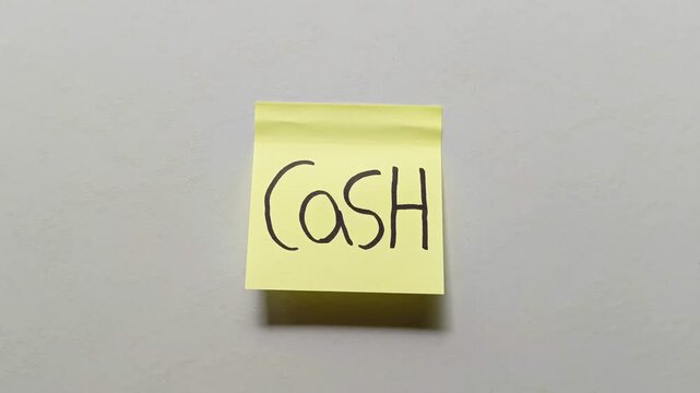 Cash sticky note isolated on white background