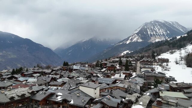 Aerial view of le Praz village in Courchevel ski resort by winter