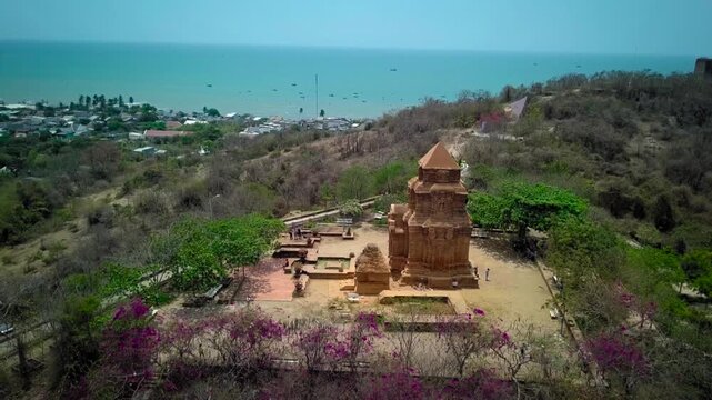 Poshanu cham tower complex on a hill with a beautiful view of the sea and the coastal city below