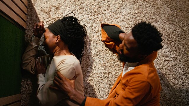 African american woman ignoring her boyfriend and giving up on the fight, man begging for a compromise and asking for a second chance. Uninterested indifferent girl offended by her partner.