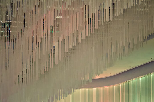 Cascading vertical rod ceiling installation