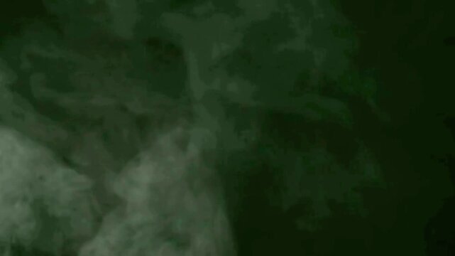 Atmospheric White Smoke and Wispy Fog Clouds Rising on Alpha Black Background for Overlay