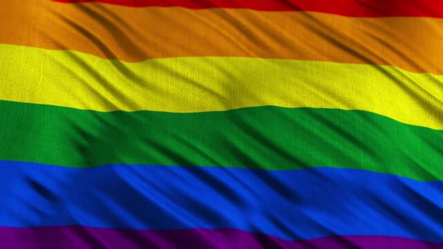 Rainbow LGBT Pride flag waving in the wind, symbol of diversity, inclusion, and human rights in a seamless loop animation.
