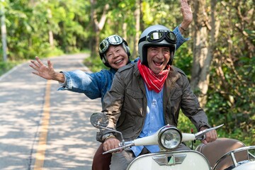 Joyful seniors riding scooter photo © Rawpixel.com