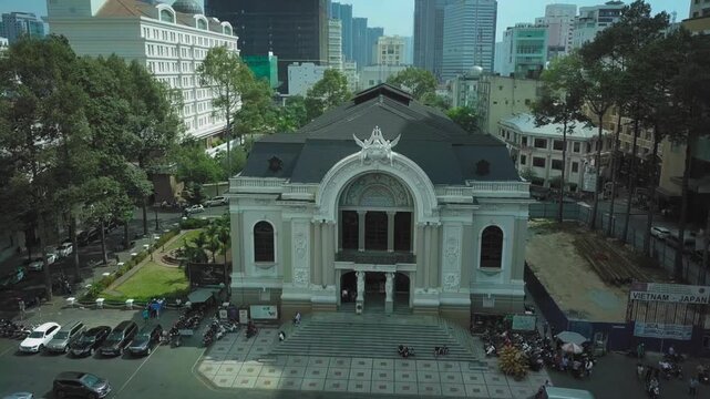 High angle view of the historic saigon opera house surrounded by modern skyscrapers in ho chi minh city